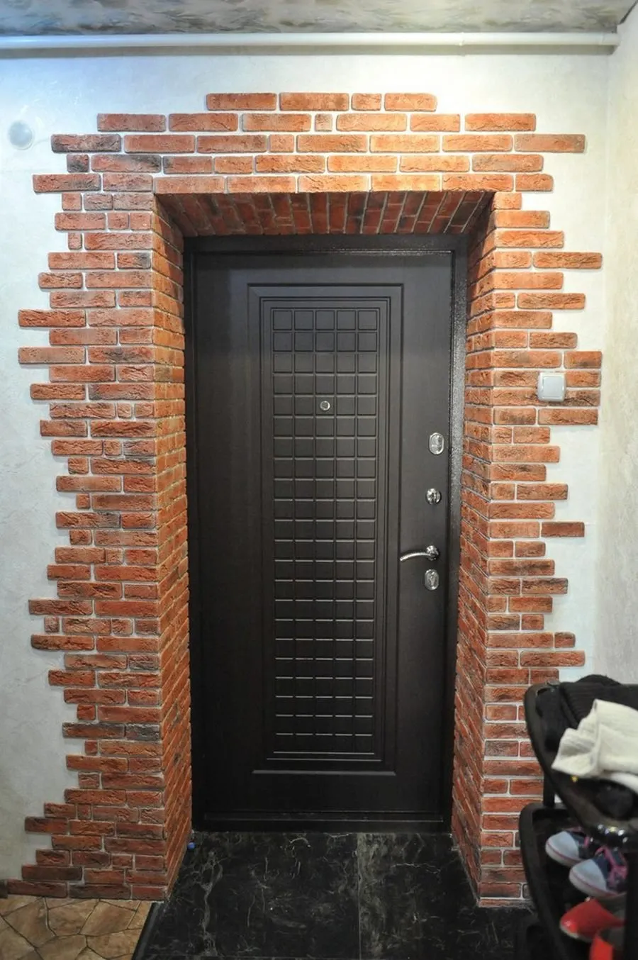 отделка дверных проемов входной двери дизайн