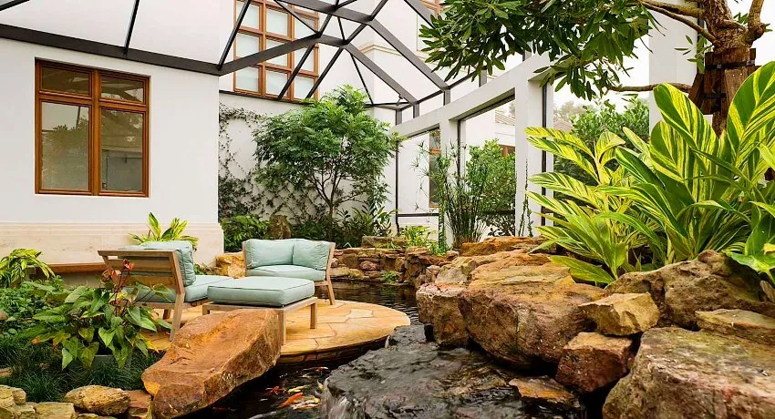 Зимний сад в частном доме — особый уголок, где размещаются различные комнатные растения, создавая особую атмосферу